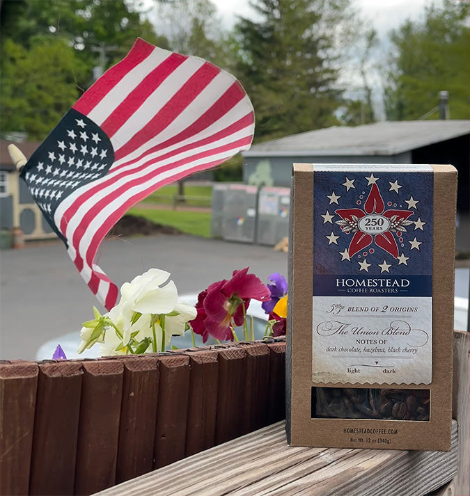 Homestead Coffee package with American flag decoration on a wooden surface